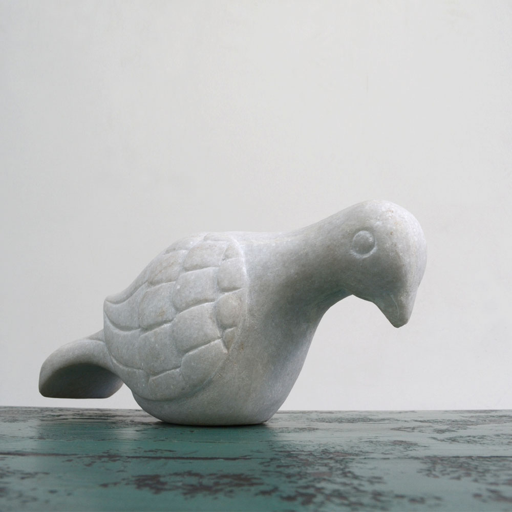    CARVED MARBLE BIRD